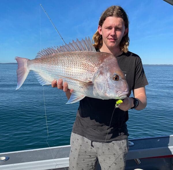 THE AUTHORS SON WITH ANOTHER QUALITY MORETON BAY SNAPPER