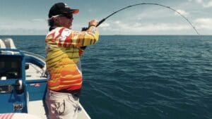 Man fishing with bent rod