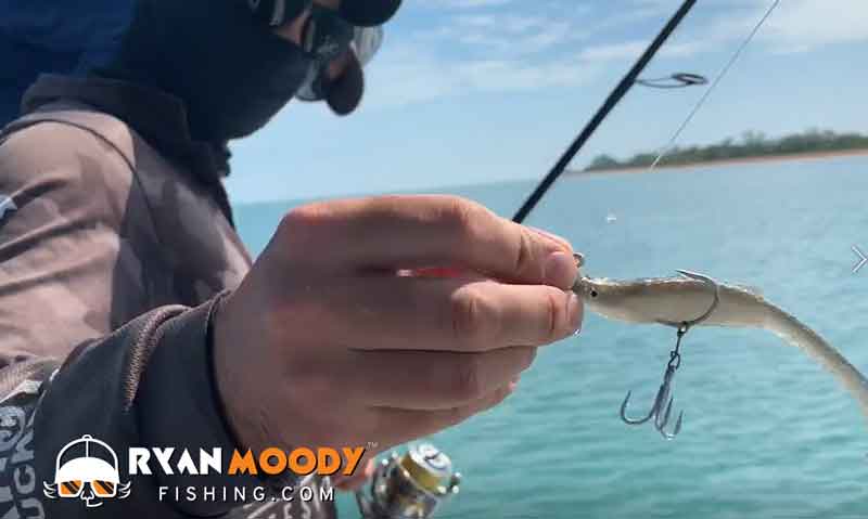 Fishing for barra in Darwin with a soft plastic and stinger rig.