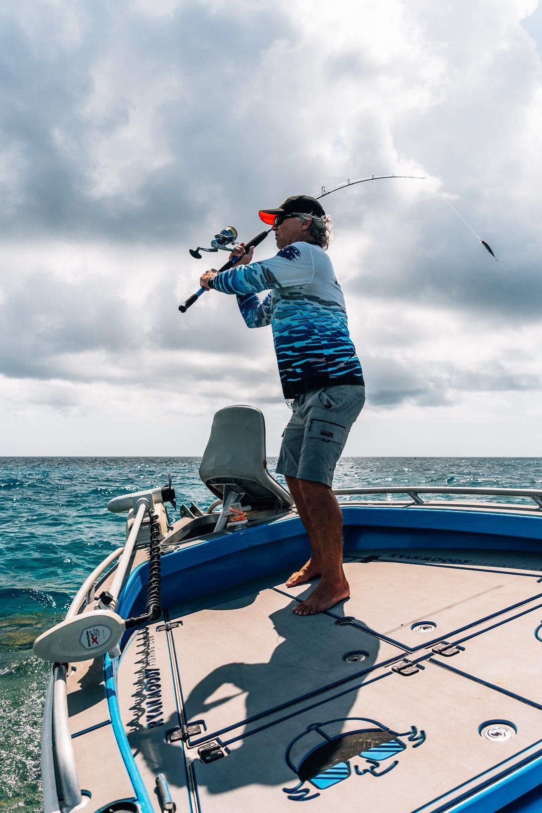 Man casting topwater catching huge GT in the GBR