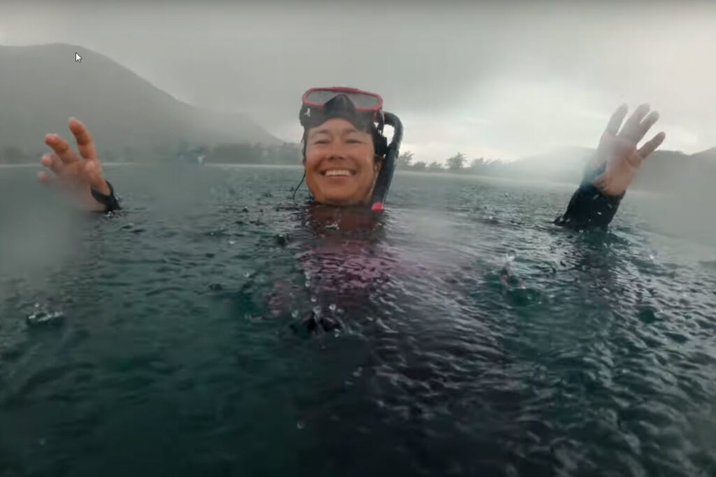Woman snorkeling in the rain