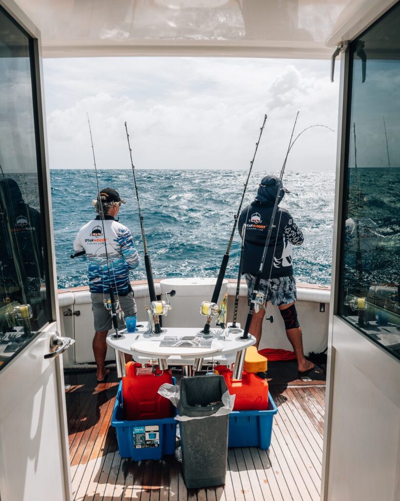 Hectic fishing session on the back deck of Mood Swings during relentless bad weather