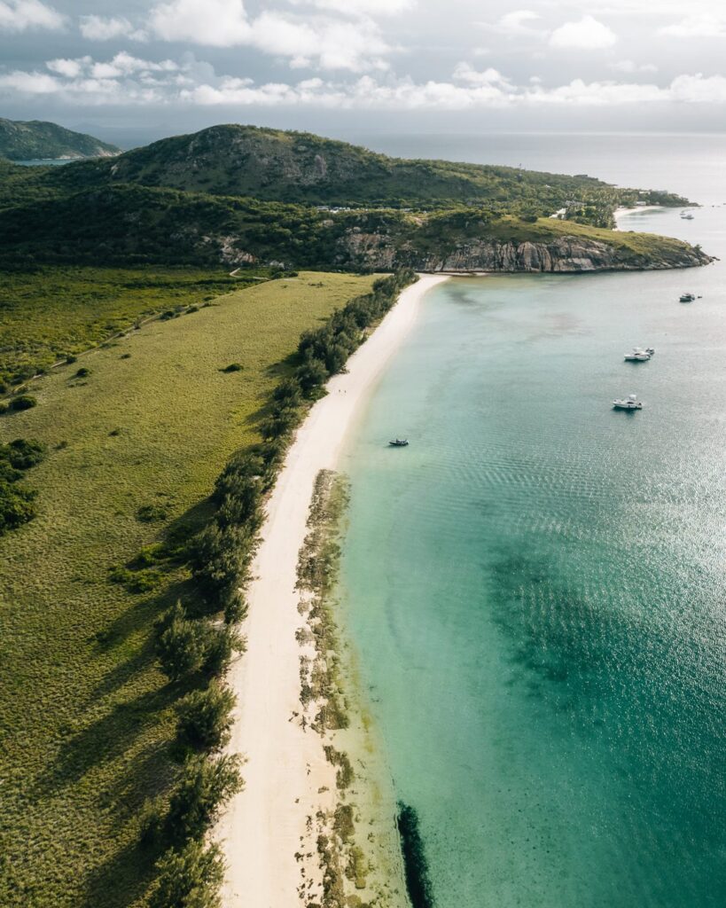 Boats anchored in remote tropical island bay