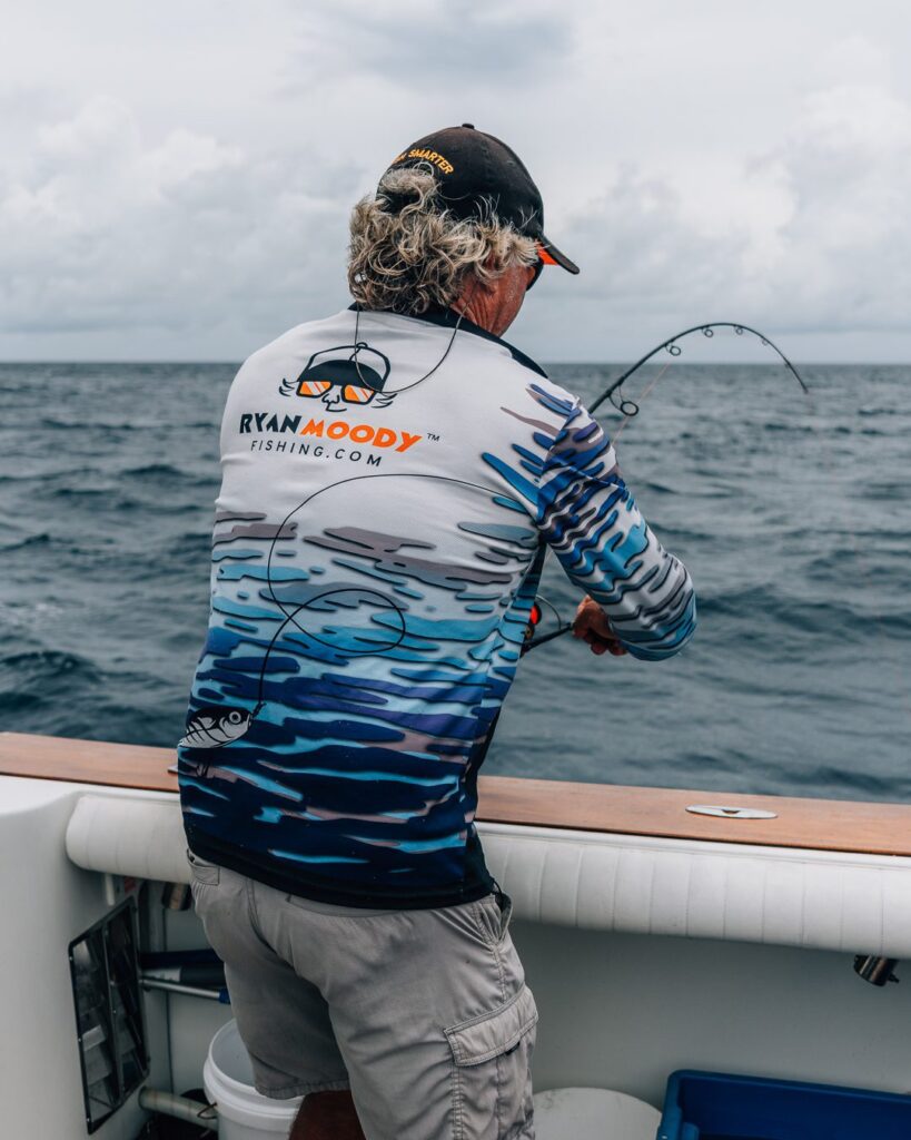 Fishing off the back of a big boat.