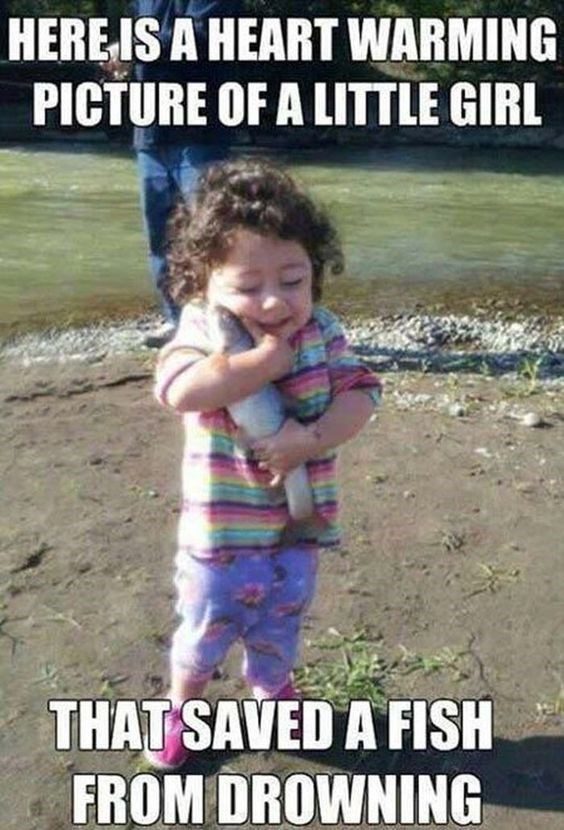 child hugging fish