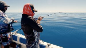 Angler fishing for Red Emperor in Central Queensland.