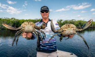 Ryan_CrabLift_HoldingTwoMudCrabs